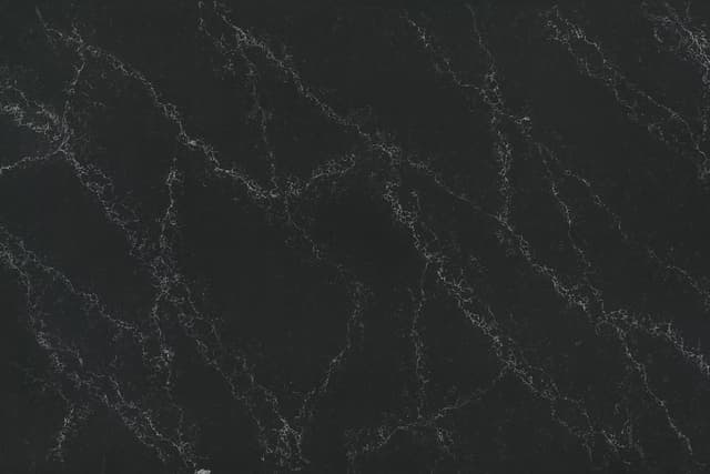 Black engineered quartz with gray/white veining 