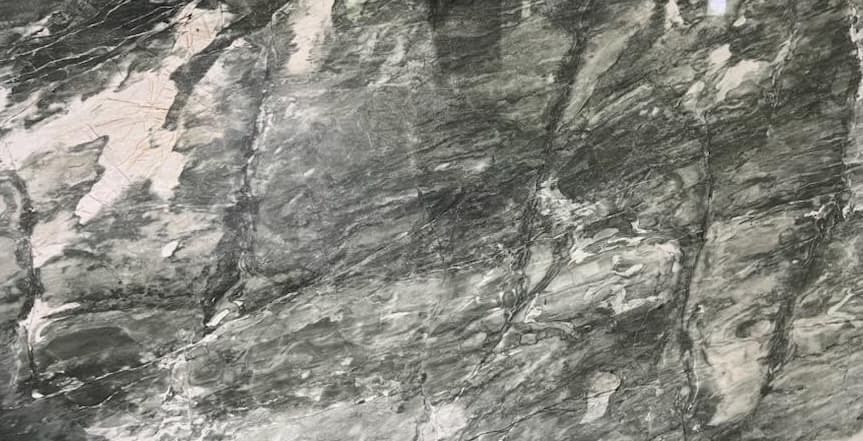 Silver quartzite with black and gray linings.