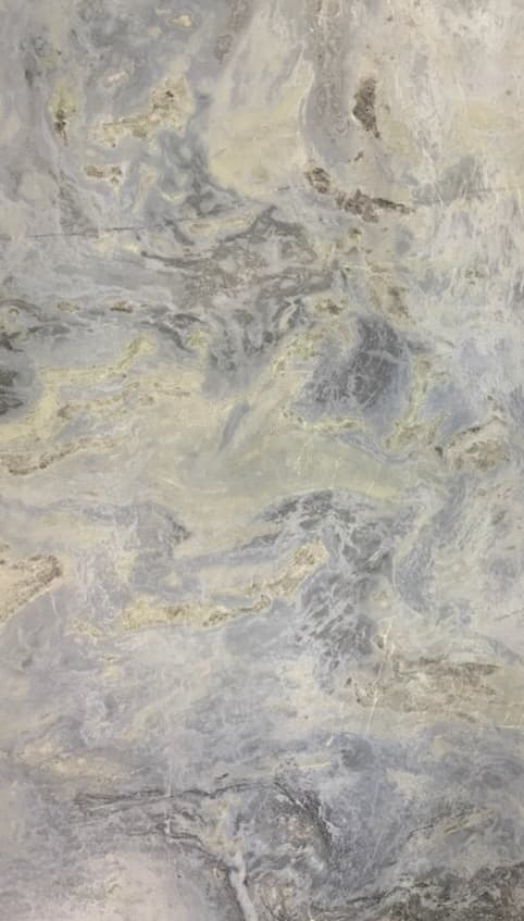 White marble with gray and blue swirls.