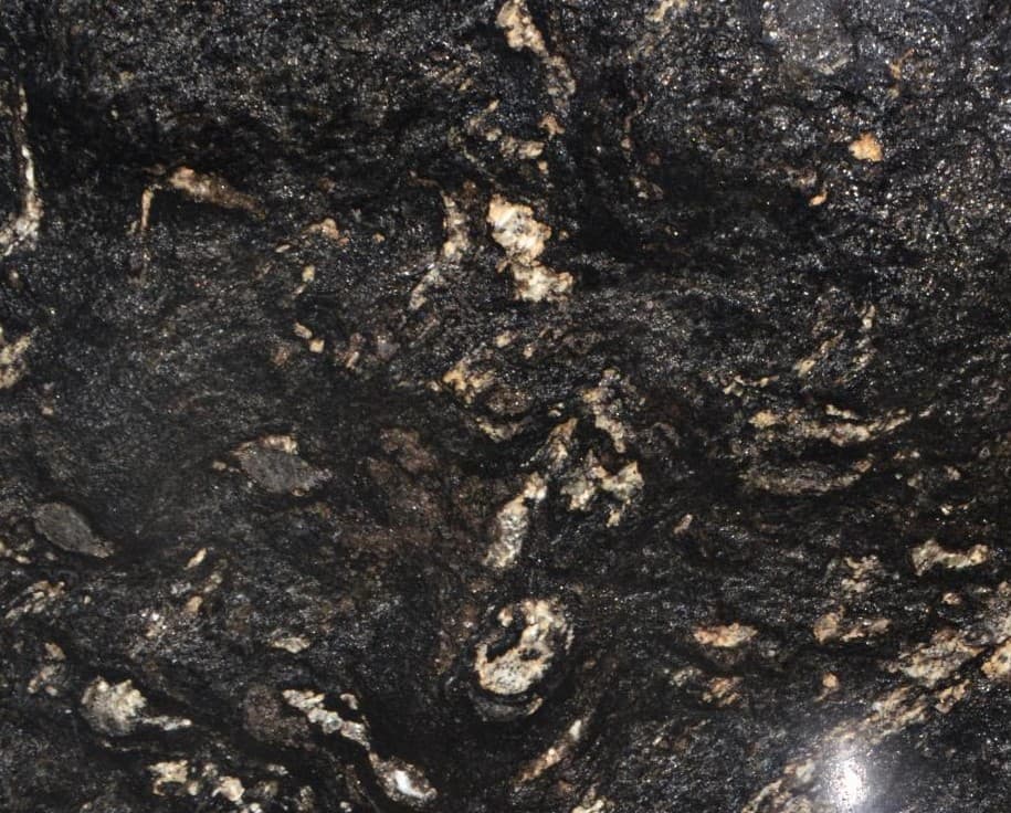 Black granite slab with gray, silver and gold swirl pattern