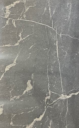 Gray granite with white and silver veined patterns.