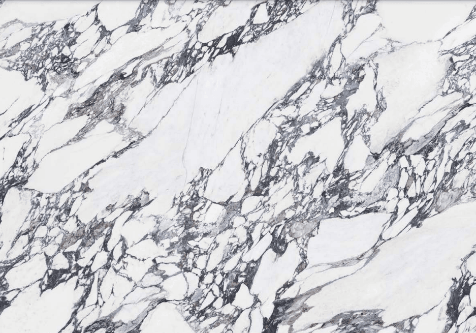 White engineered porcelain with warm-gray veining.