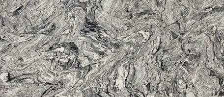 White and black granite with gray and silver swirl patterns.