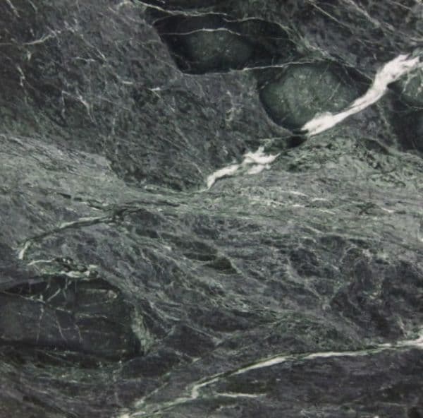 Black marble with jade green and gray veining.