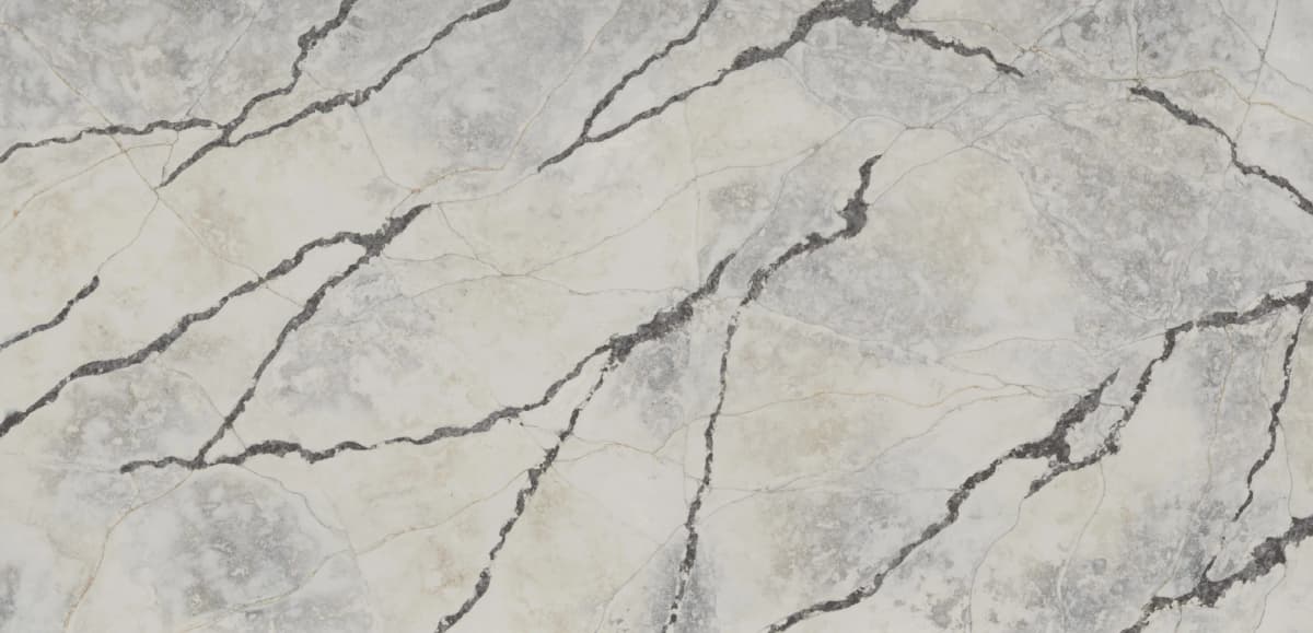 The Ijen Azul quartz slab resembles the shimmering iridescence that echoes the moonlit reflections on calm waters. Across the surface, delicate veins of azure and silver traverse with the elegance of mist, creating a sense of movement and depth.