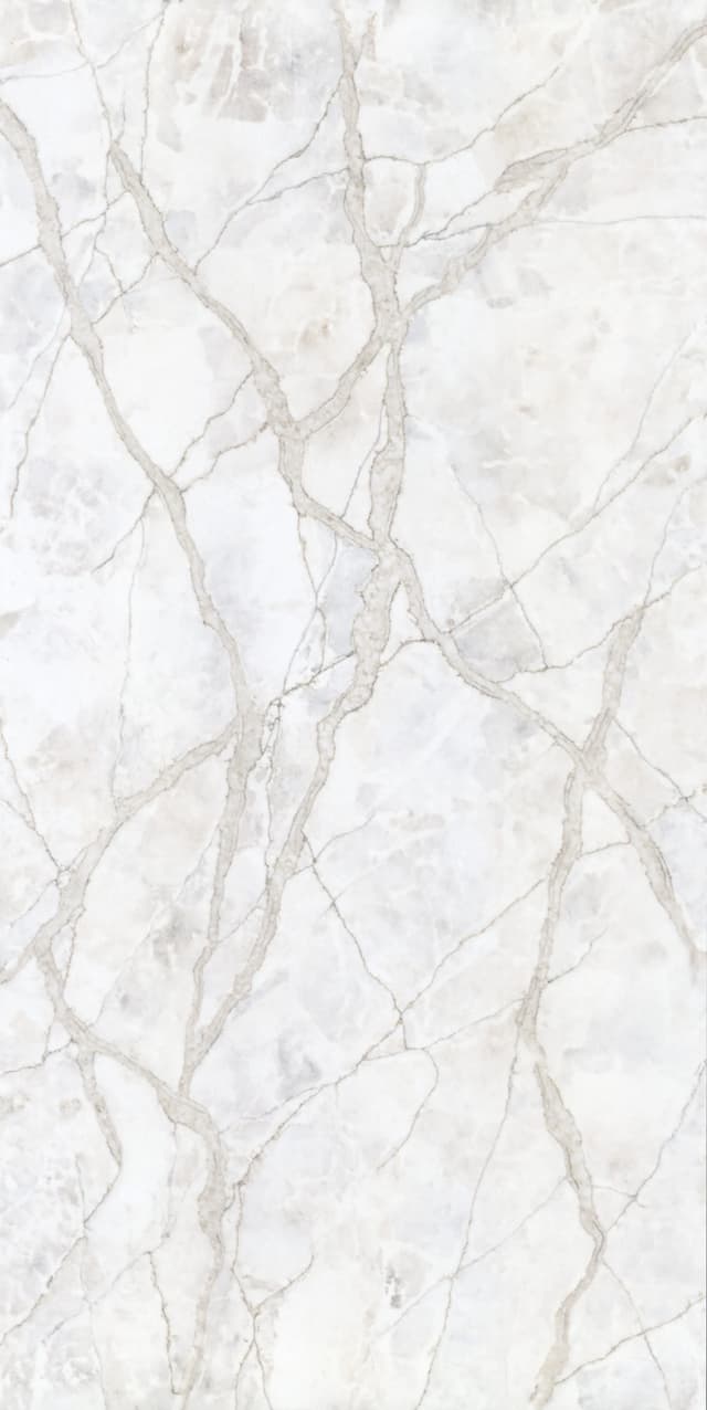 Introducing the Lumen Sky quartz slab, featuring a soft base of taupe, beige and coral with a luminous quality, reflecting light in a way that mimics the gentle glow of the sun. Ideal for creating a serene and uplifting atmosphere in any interior space.